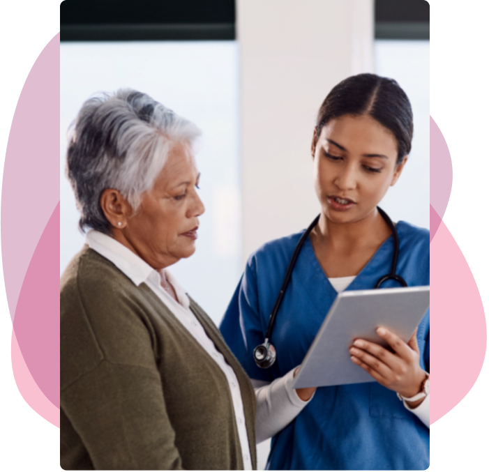 Doctor explaining angioplasty symptoms to a patient