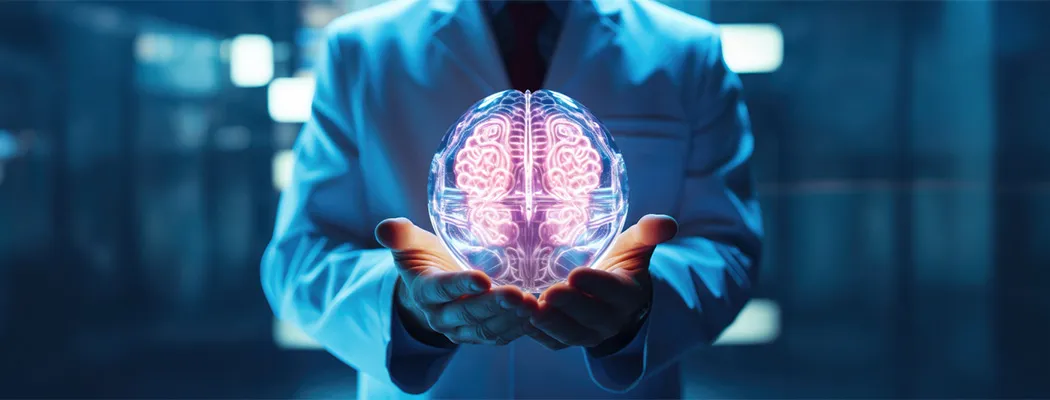 Brain scan on hospital monitor with surgeon in background