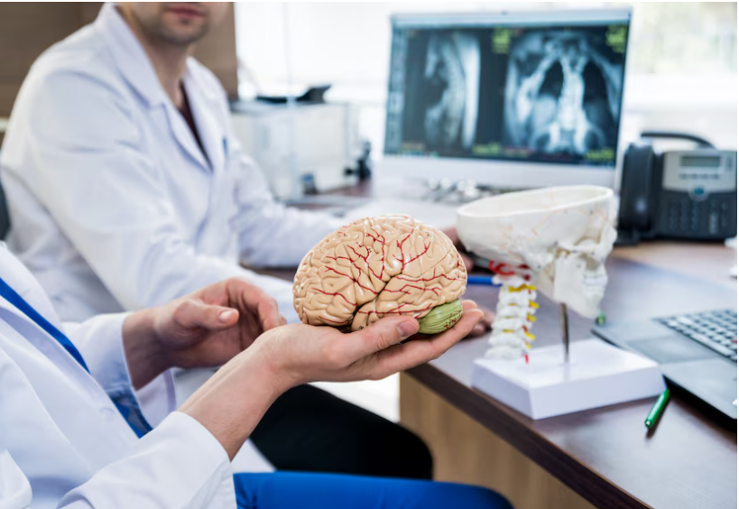 Two doctors discussing brain tumour issues